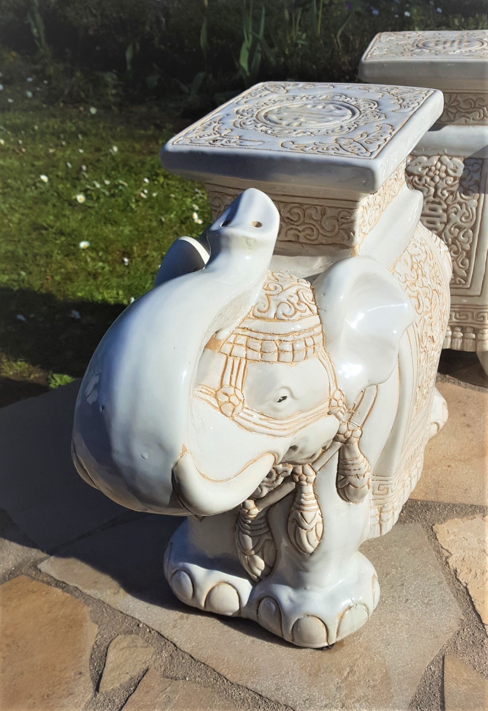 Pair of enamelled white ceramic elephant harnesses