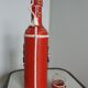 Bottle bottle leather dressing and its shot glass