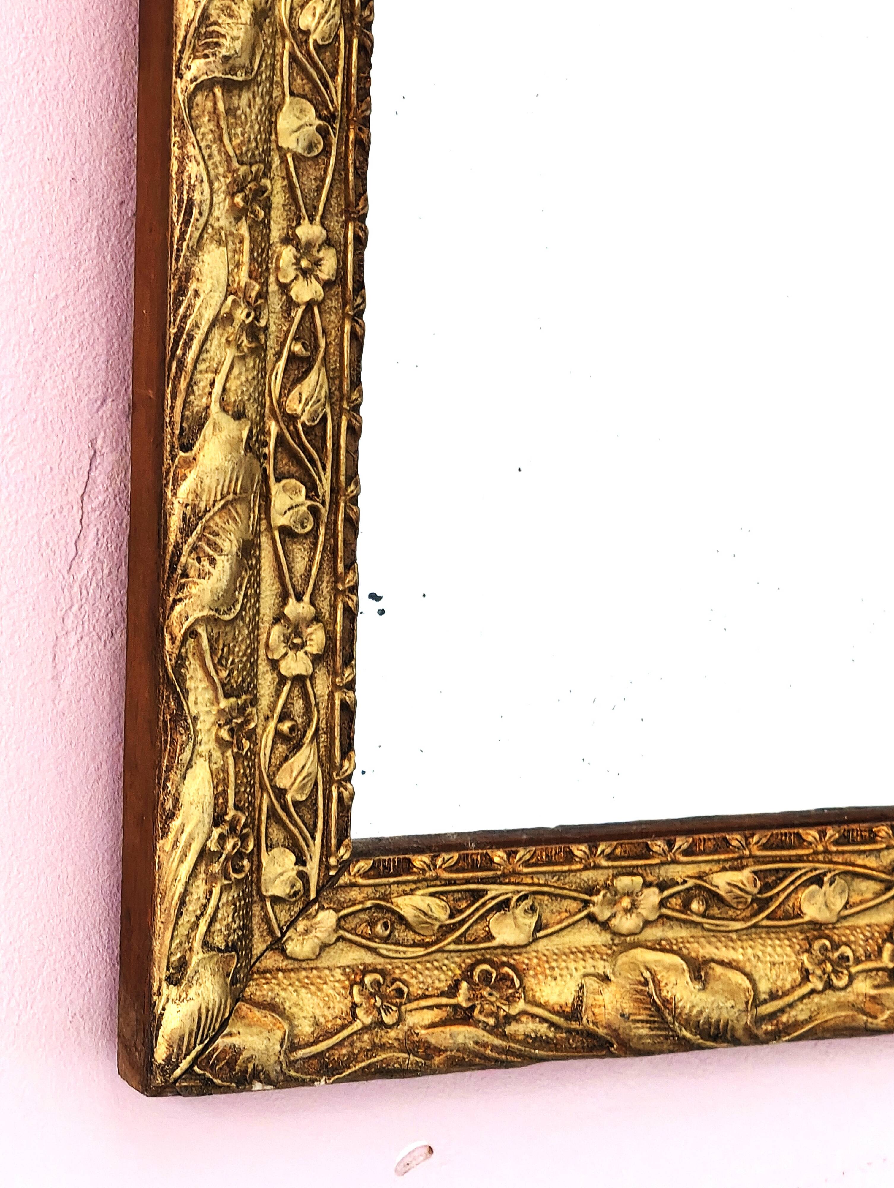Miroir rectangulaire Art déco, cadre doré et travaillé