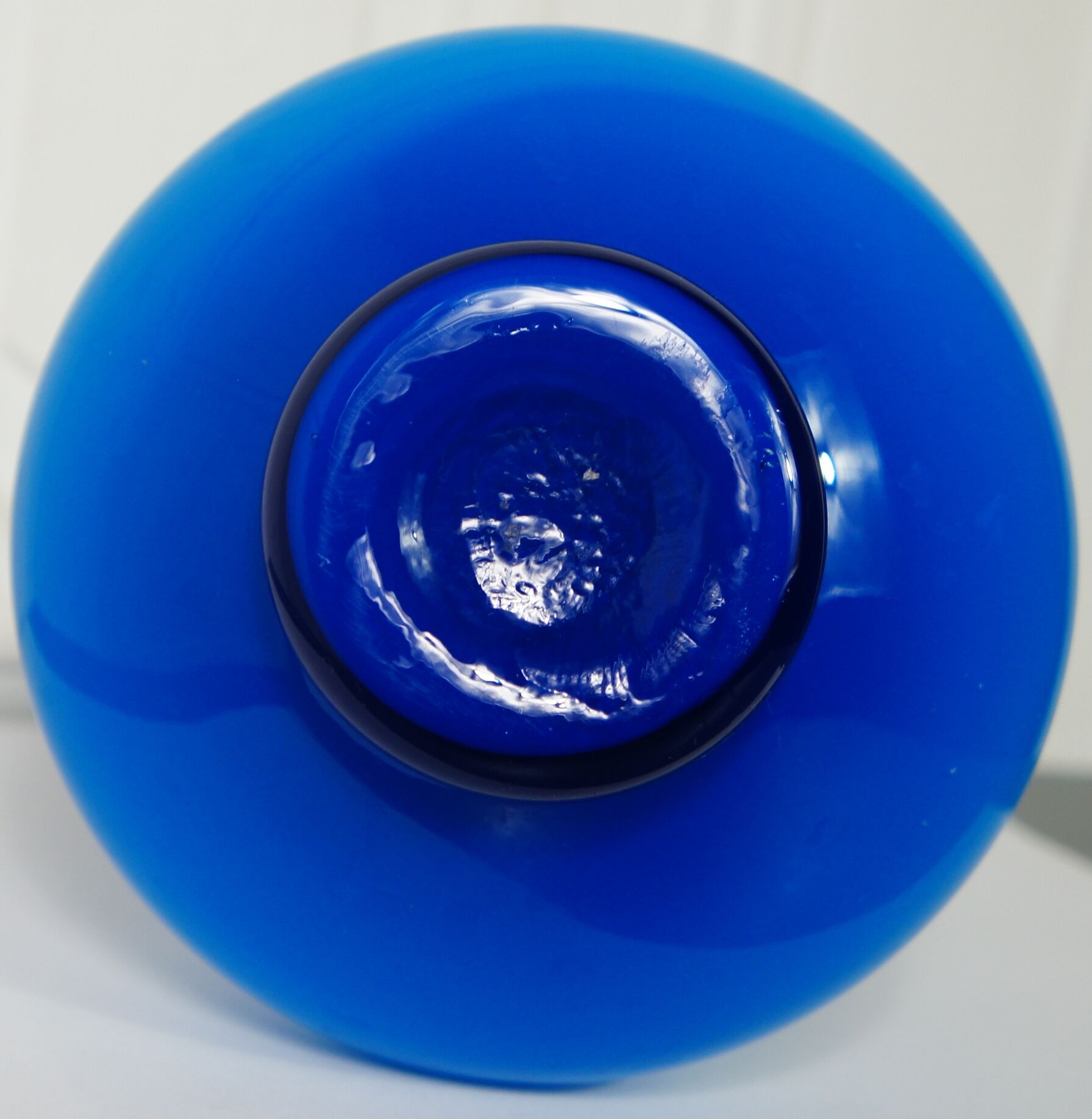 Flattened blown glass corolla vase