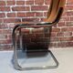 Suite of four Italian chairs in fabric and metal