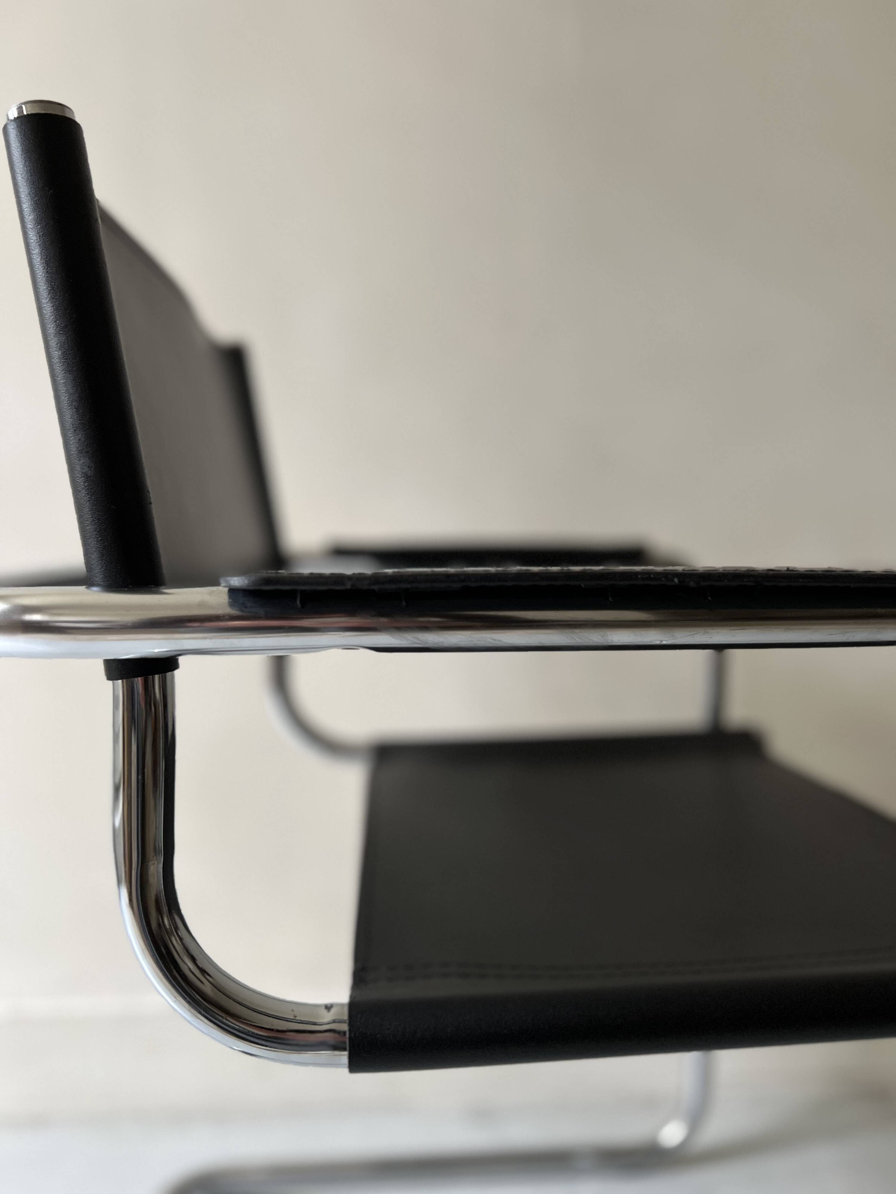Chrome and black leather armchair