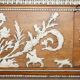 Victorian antique fireplace in tarred pine and sculpted gesso.