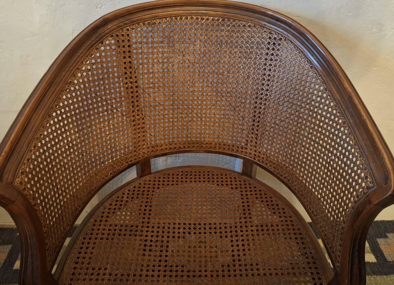 Half-moon rattan and hardwood armchair, early 20th century