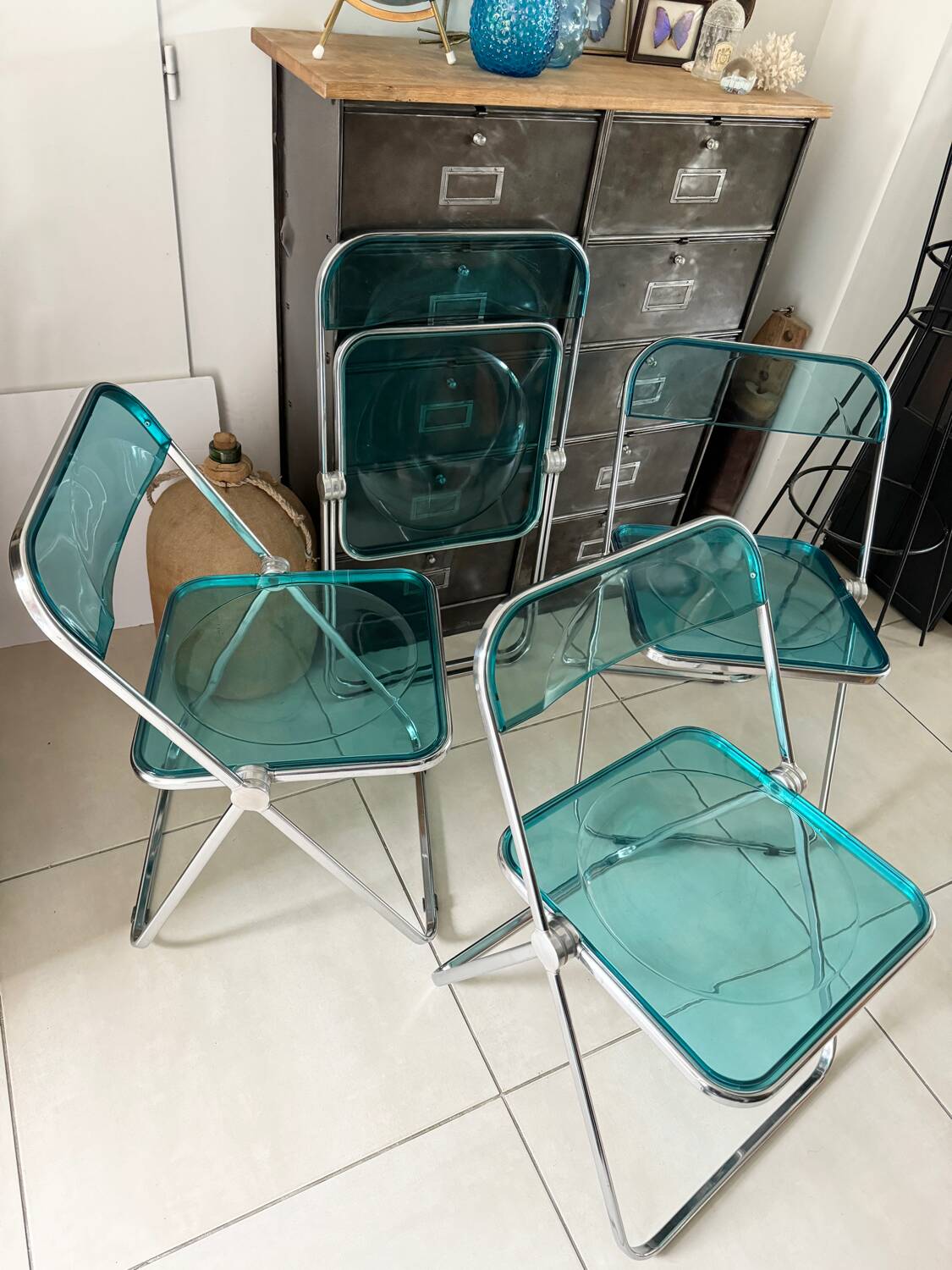 Set of 4 blue Plia folding chairs by Castelli
