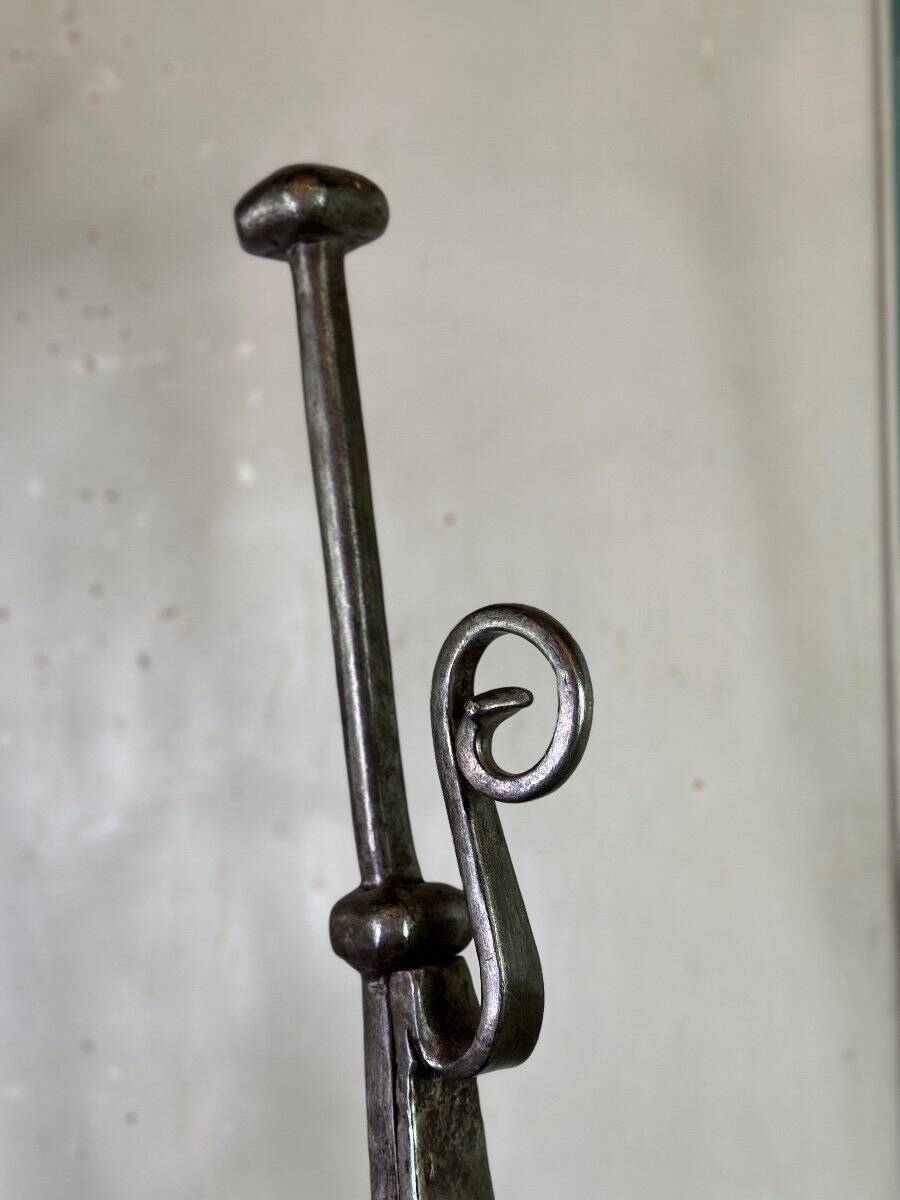 Pair of wrought iron candlesticks, 18th century