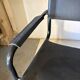 Set of 12 vintage black leather and tubular steel chairs – Italy, year
