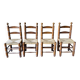 Set of 4 solid wood chairs with straw seats.
