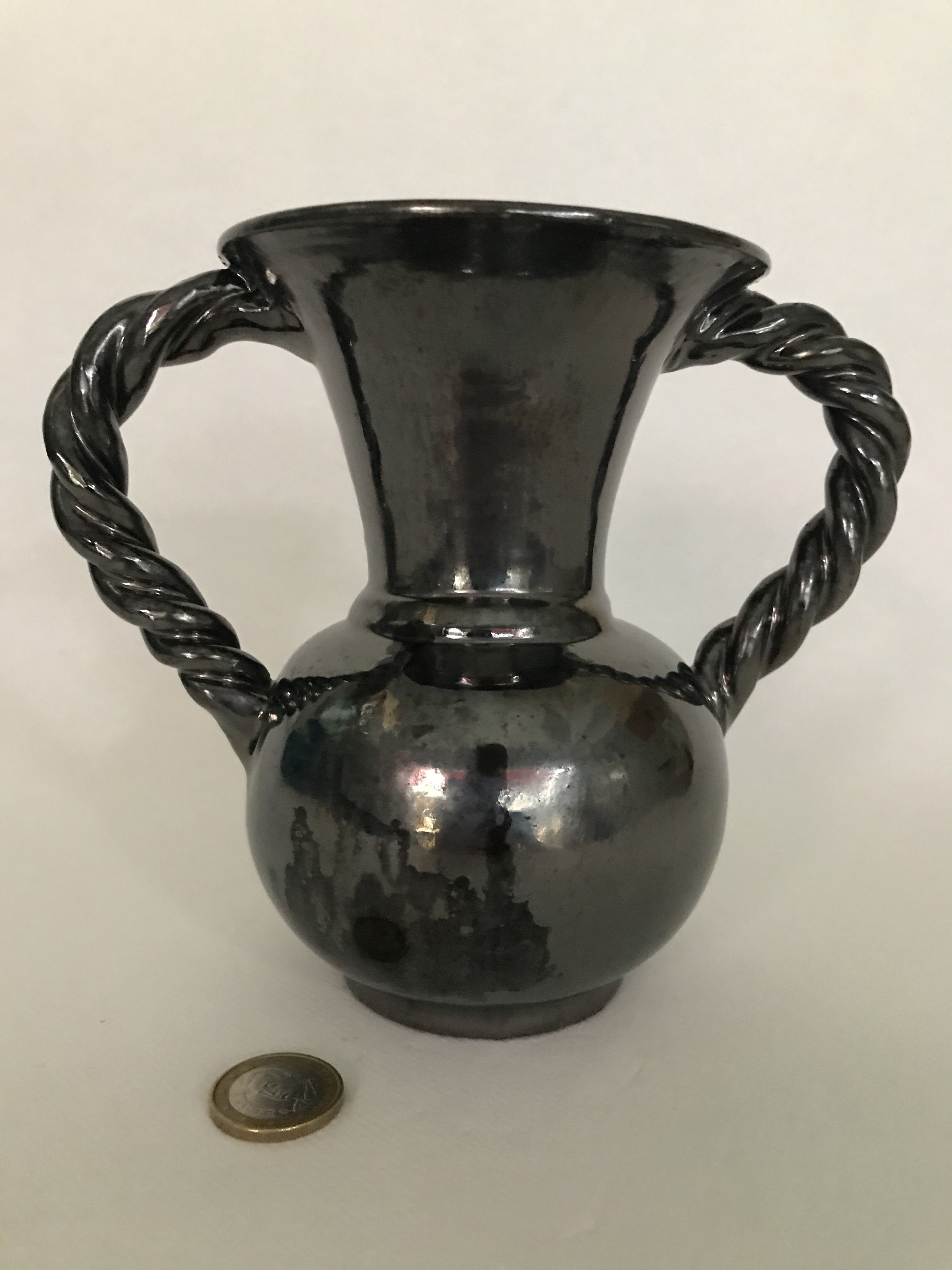 Black vase with twisted handles signed Blaise Rubino in Vallauris, circa 1950/1960