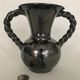Black vase with twisted handles signed Blaise Rubino in Vallauris, circa 1950/1960