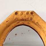 Small octagonal mirror in gold leather