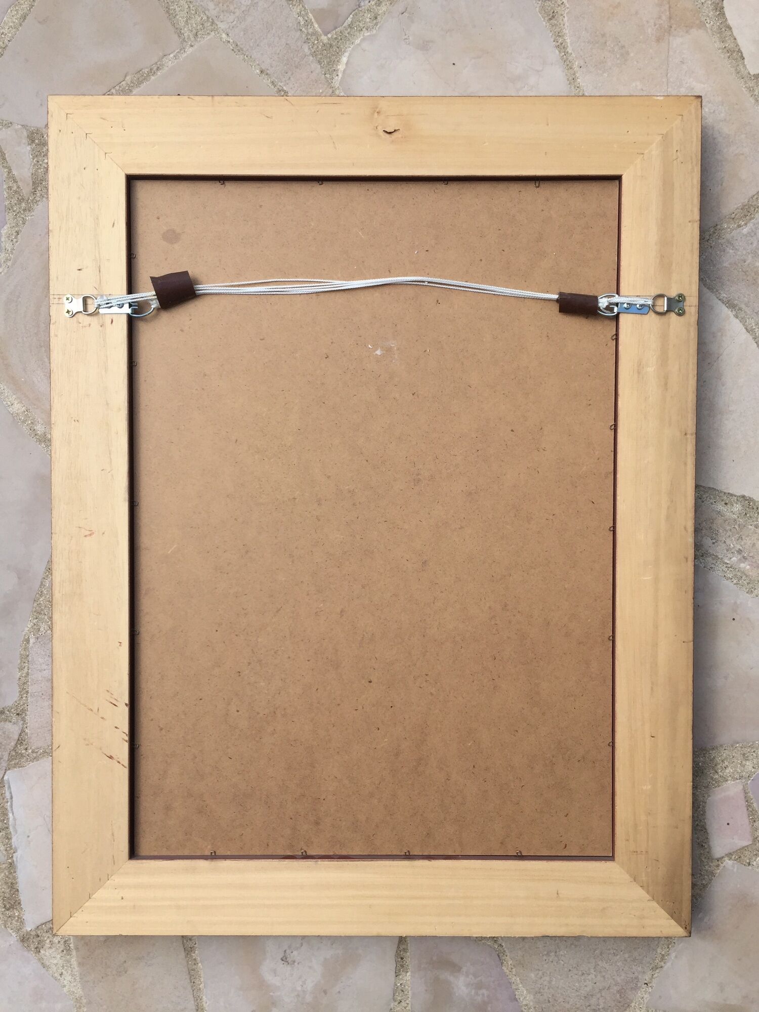 Pair of bevelled mirrors in white and gilded wood 86 x 66 cm