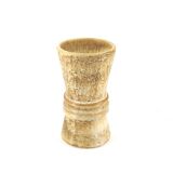 Beige coarse earthenware vase in the shape of an hourglass