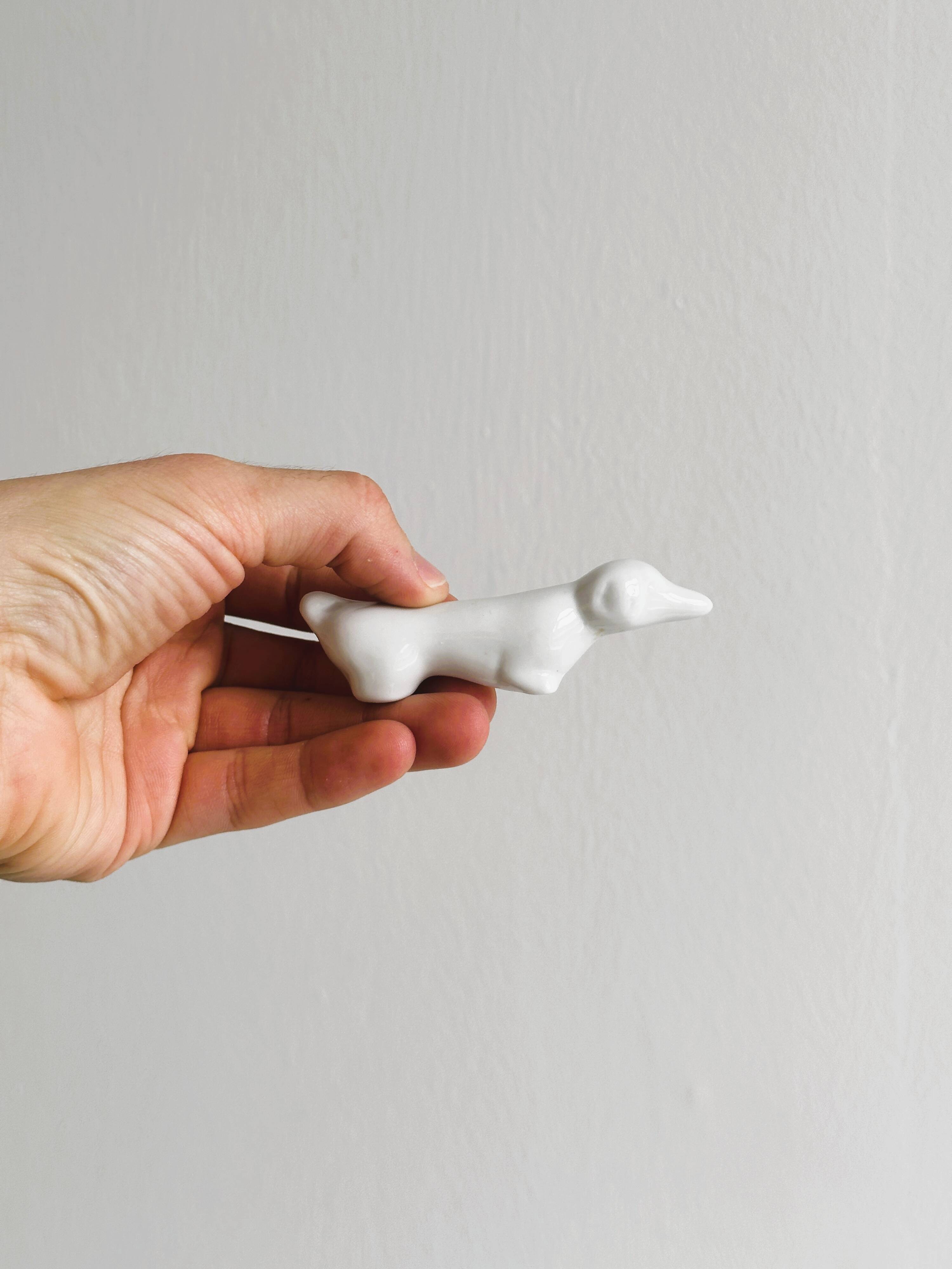 6 vintage white porcelain knife rests