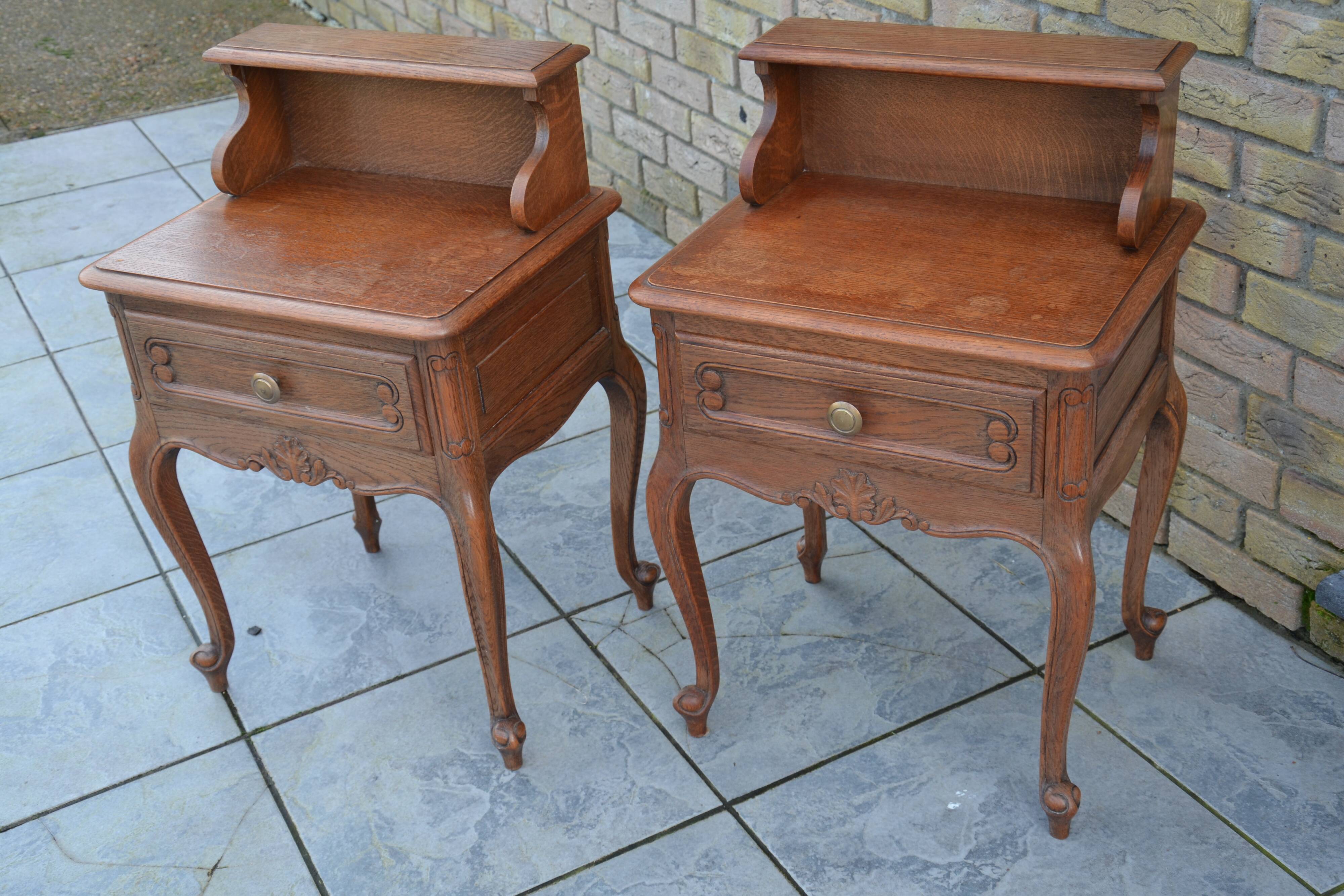 Two oak bedside tables.