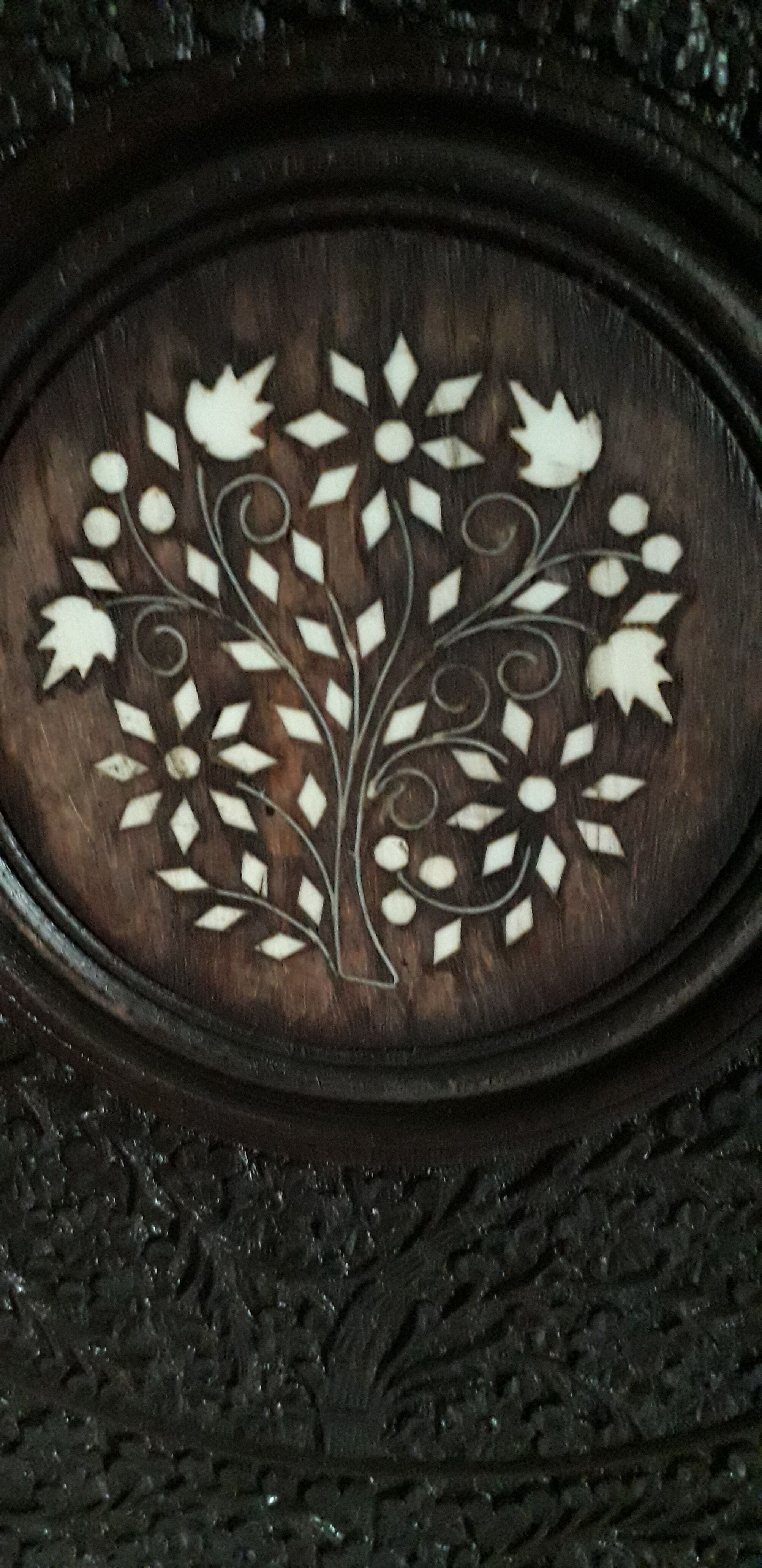 Old coffee table carved in teak wood