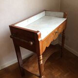Old walnut dressing table with its toiletries
