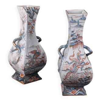 Pair of Saint-Clément vases decorated with birds and vegetation 1900