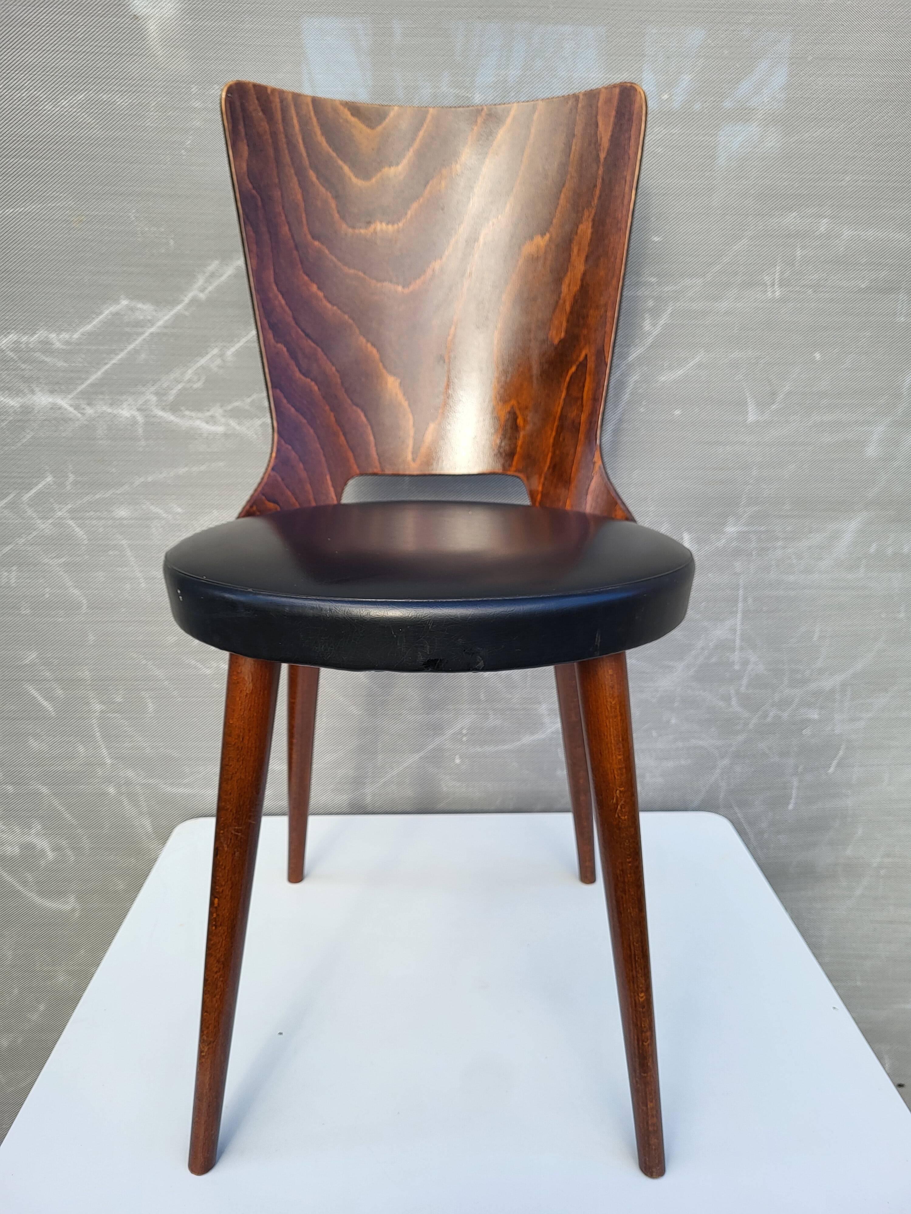 Pair of Dove chairs • Baumann • Black faux leather