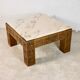 Table basse bois sculpté et marbre