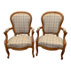 Paire de fauteuils de style Louis Philippe en hêtre teinté XX siècle
