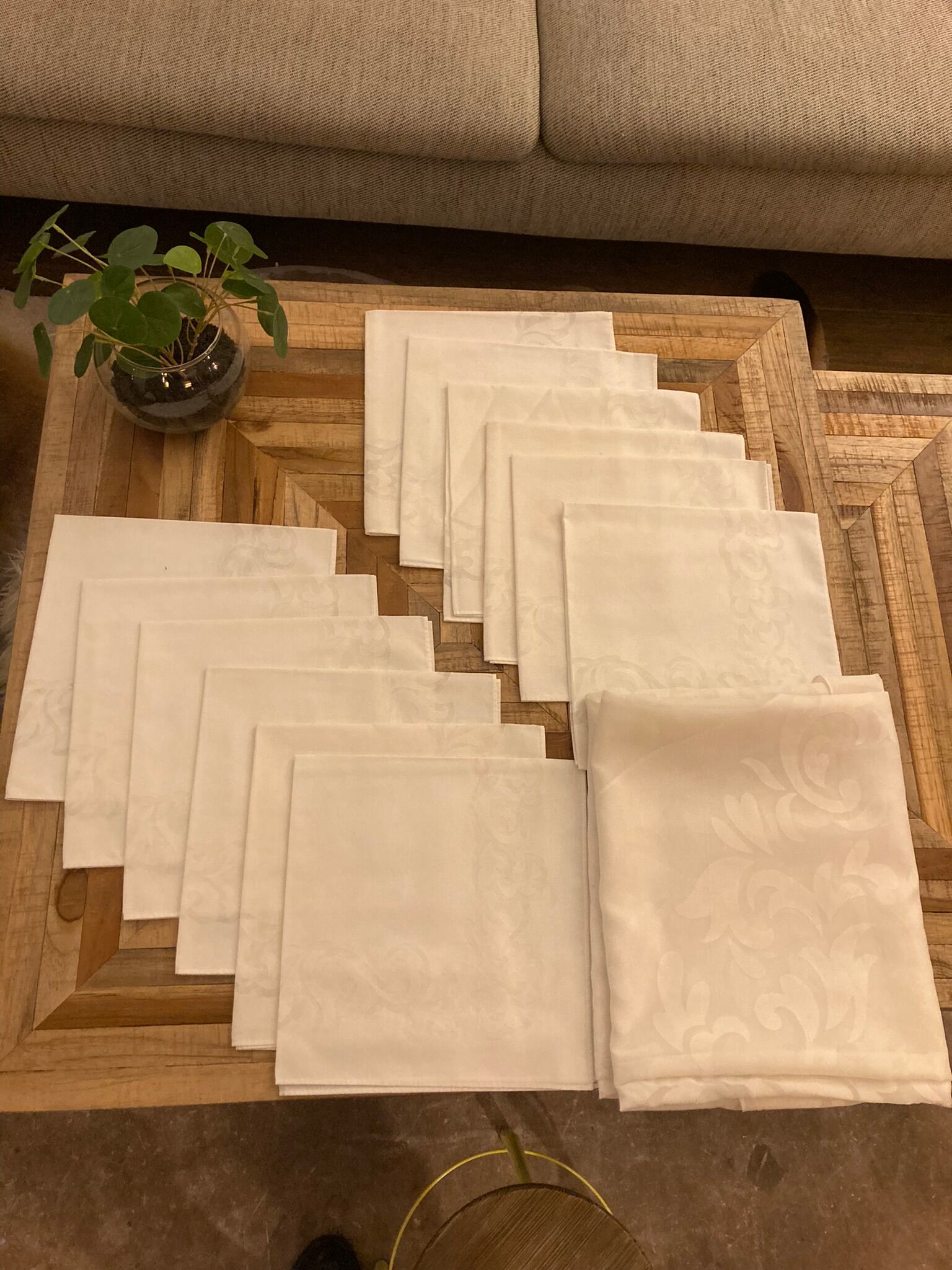 Set white tablecloth and 12 matching towels, hand embroidered