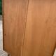Rattan wardrobe with tapered legs from the 1960s.