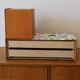 Console, freestanding or wall-mounted Scandinavian shelf in teak and paper with Josef Frank pattern.
