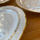 6 fine porcelain dinner plates with gold frieze