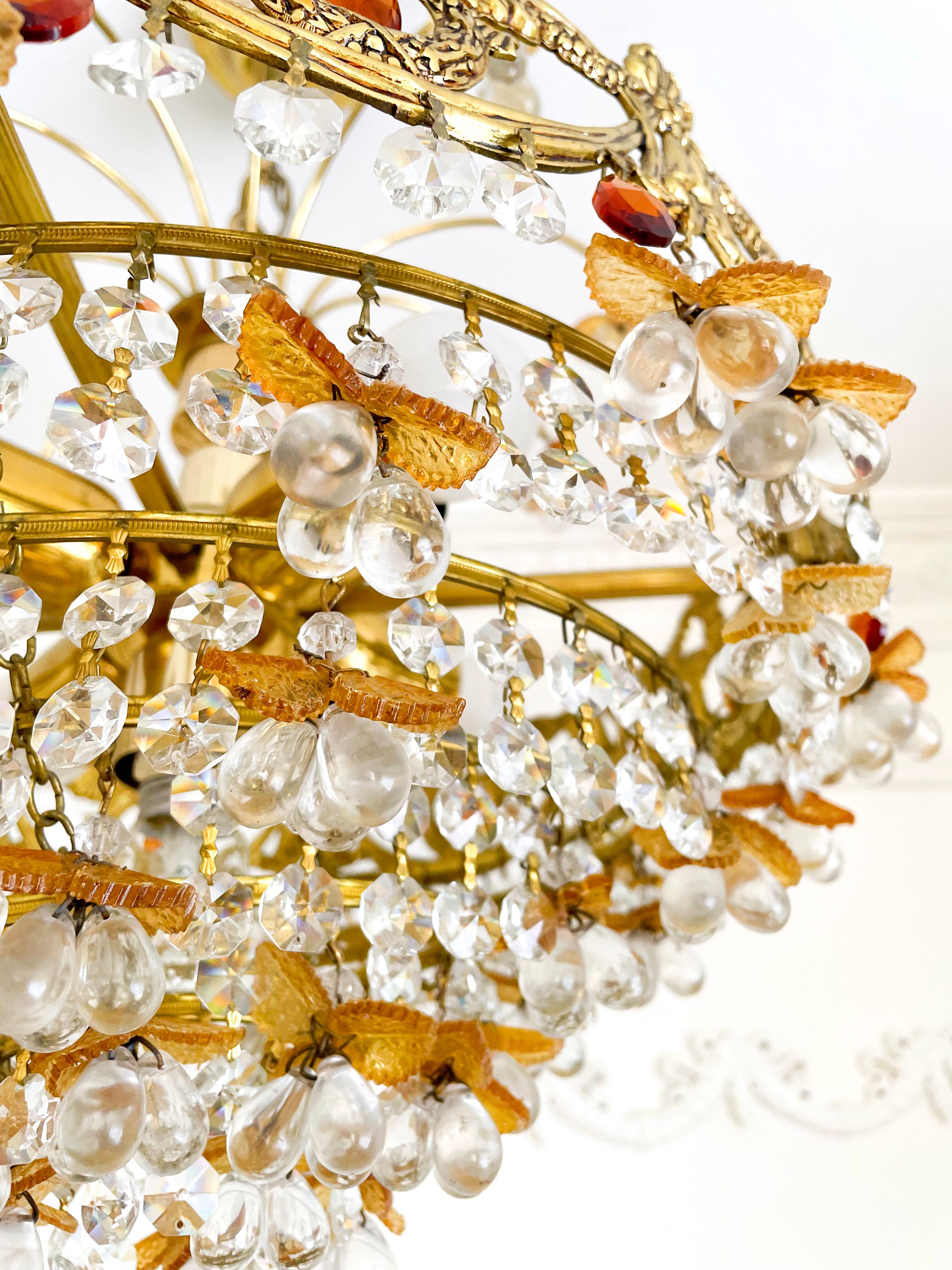 Exceptional vintage chandelier in Murano style crystal, orange, brass.