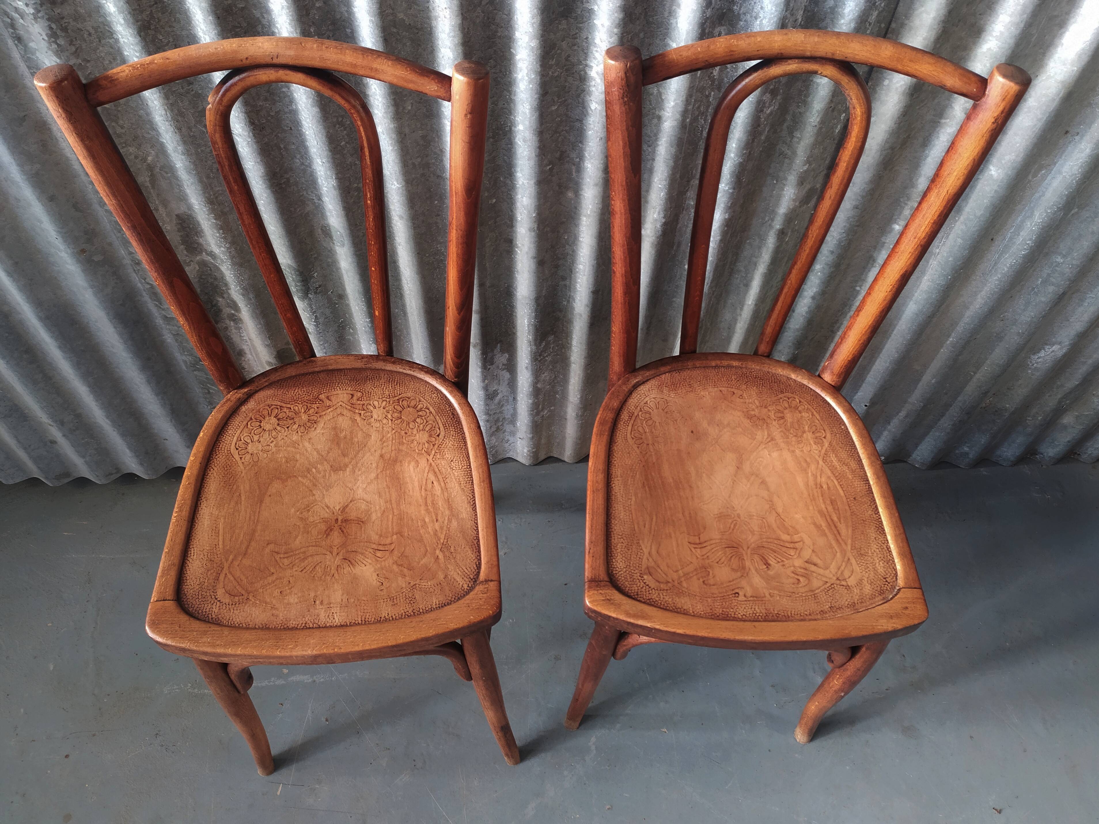 Pair of curved wooden bistro chairs