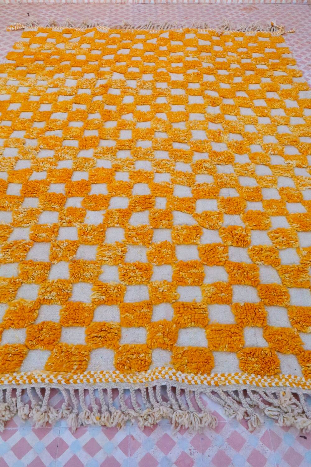 Yellow and white checkered Berber rug