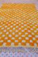 Yellow and white checkered Berber rug