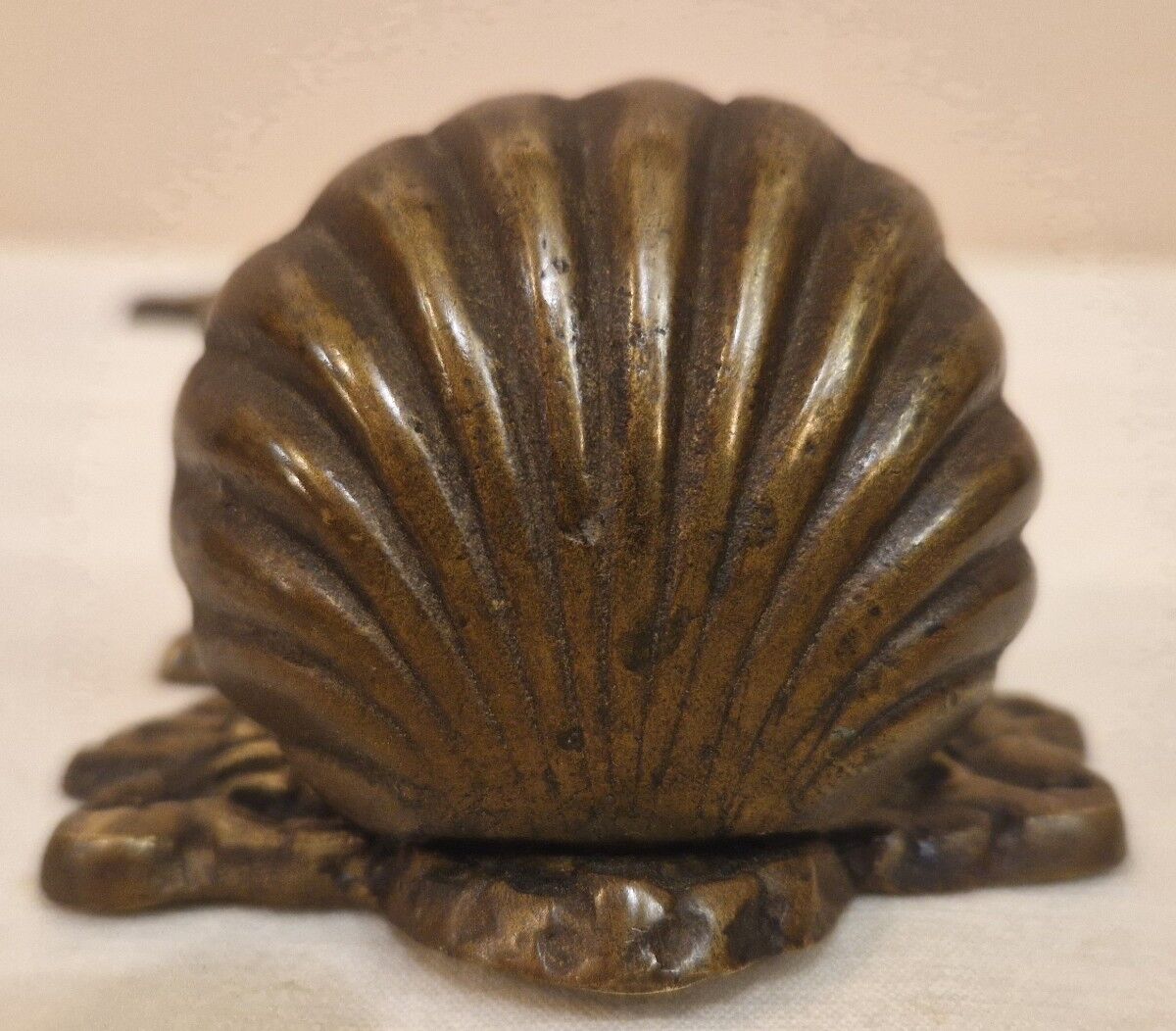 Bronze holy water font from the late 19th century.