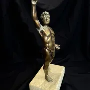 Antique bronze sculpture on a marble base, Roaring Twenties, around 1930.