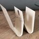 White lacquered metal magazine rack from the 1970s