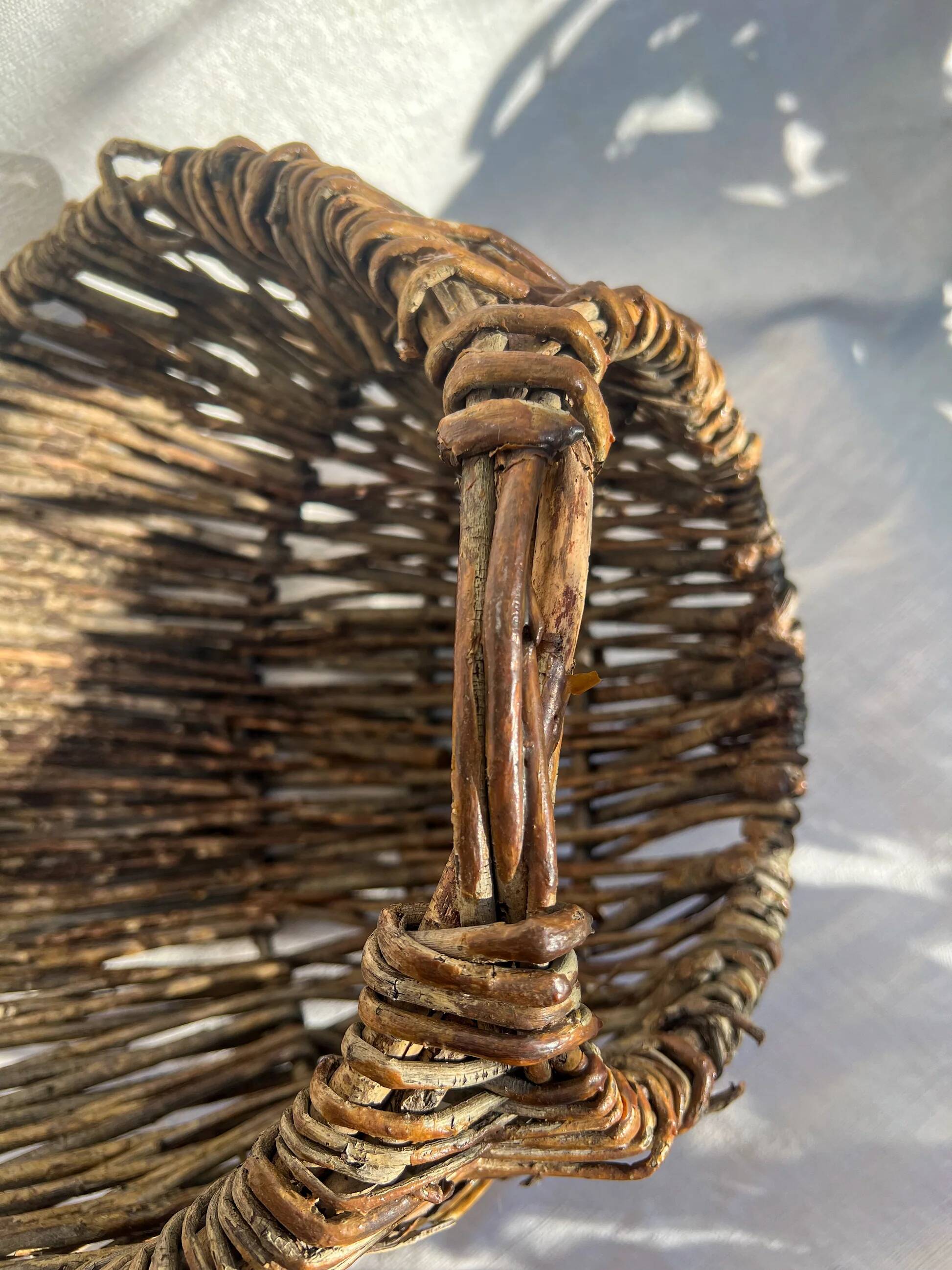 Hand-woven wicker harvest basket