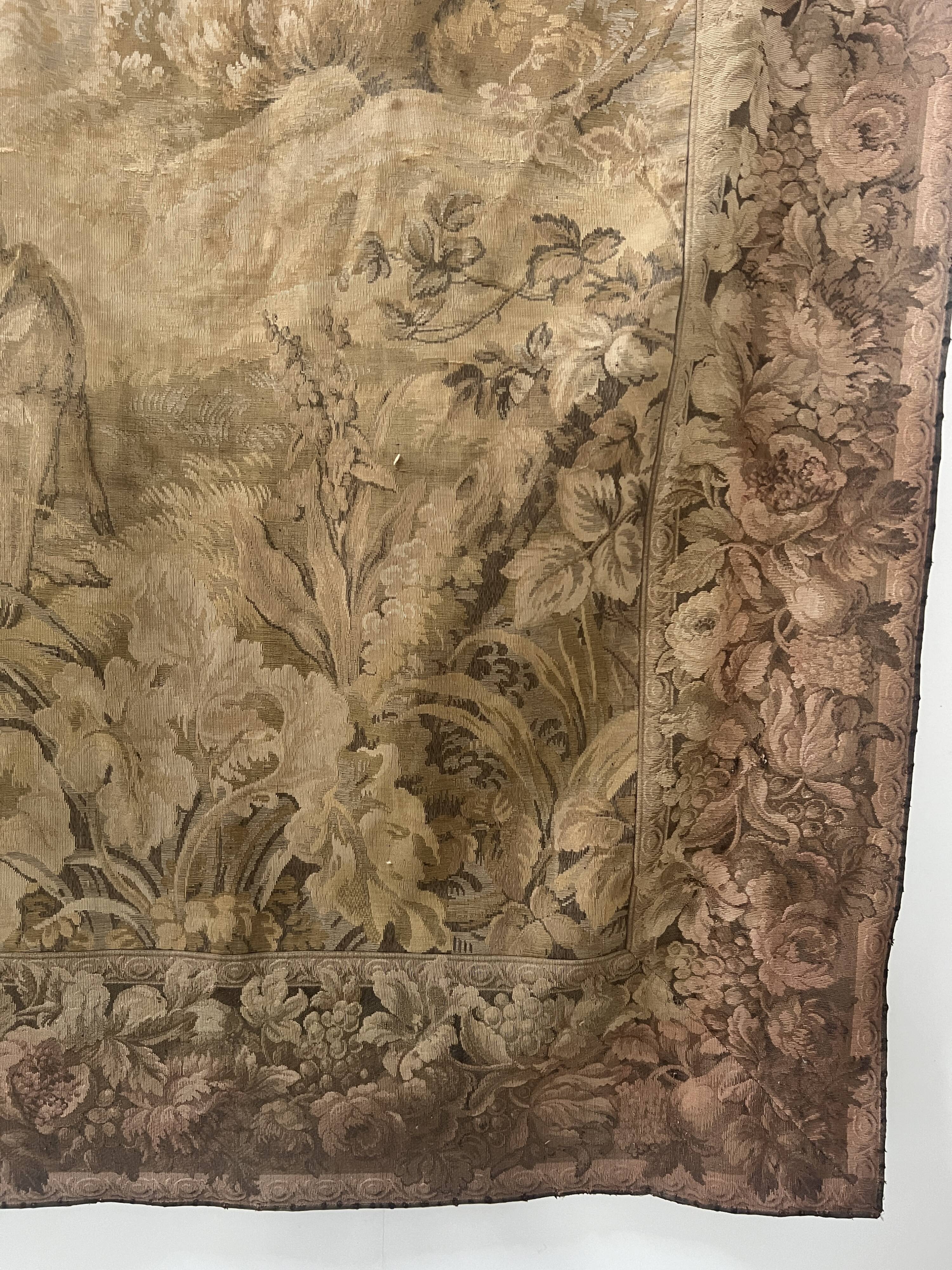 Renaissance-style tapestry with animal motifs, 20th century.