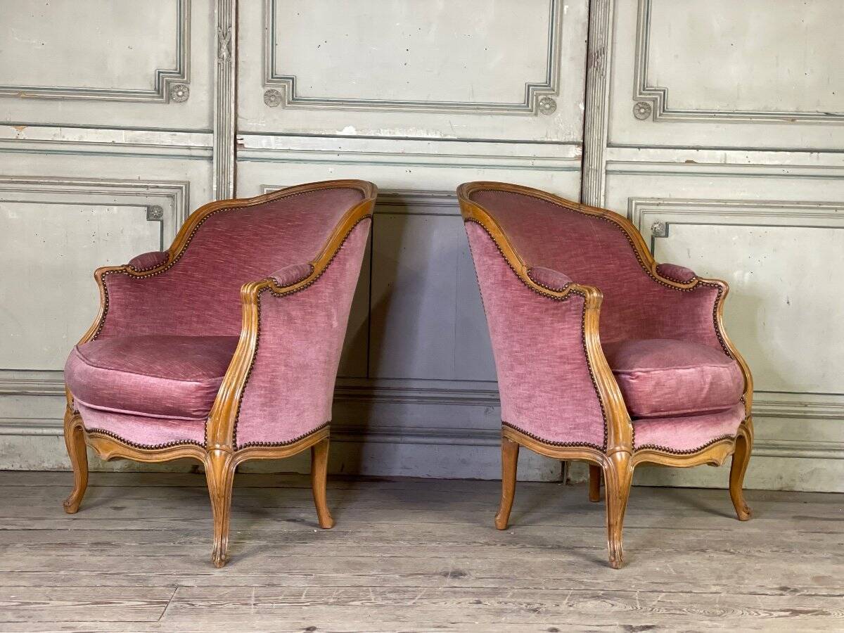 Pair of Louis XV style bergère armchairs in carved wood, pink velvet, circa 1900