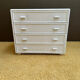 White rattan chest of drawers