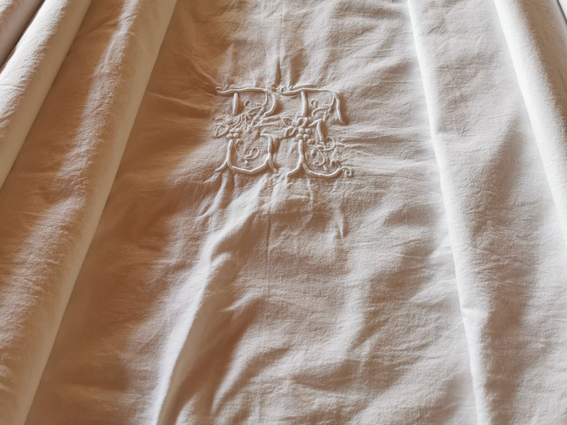 Antique monogrammed fabric