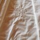 Antique monogrammed fabric