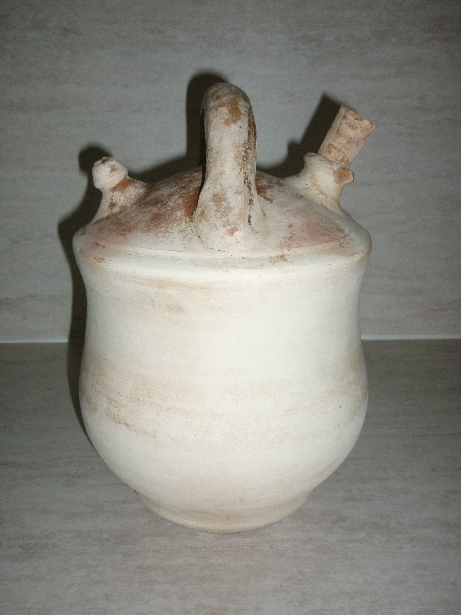 Ancient natural terracotta jug