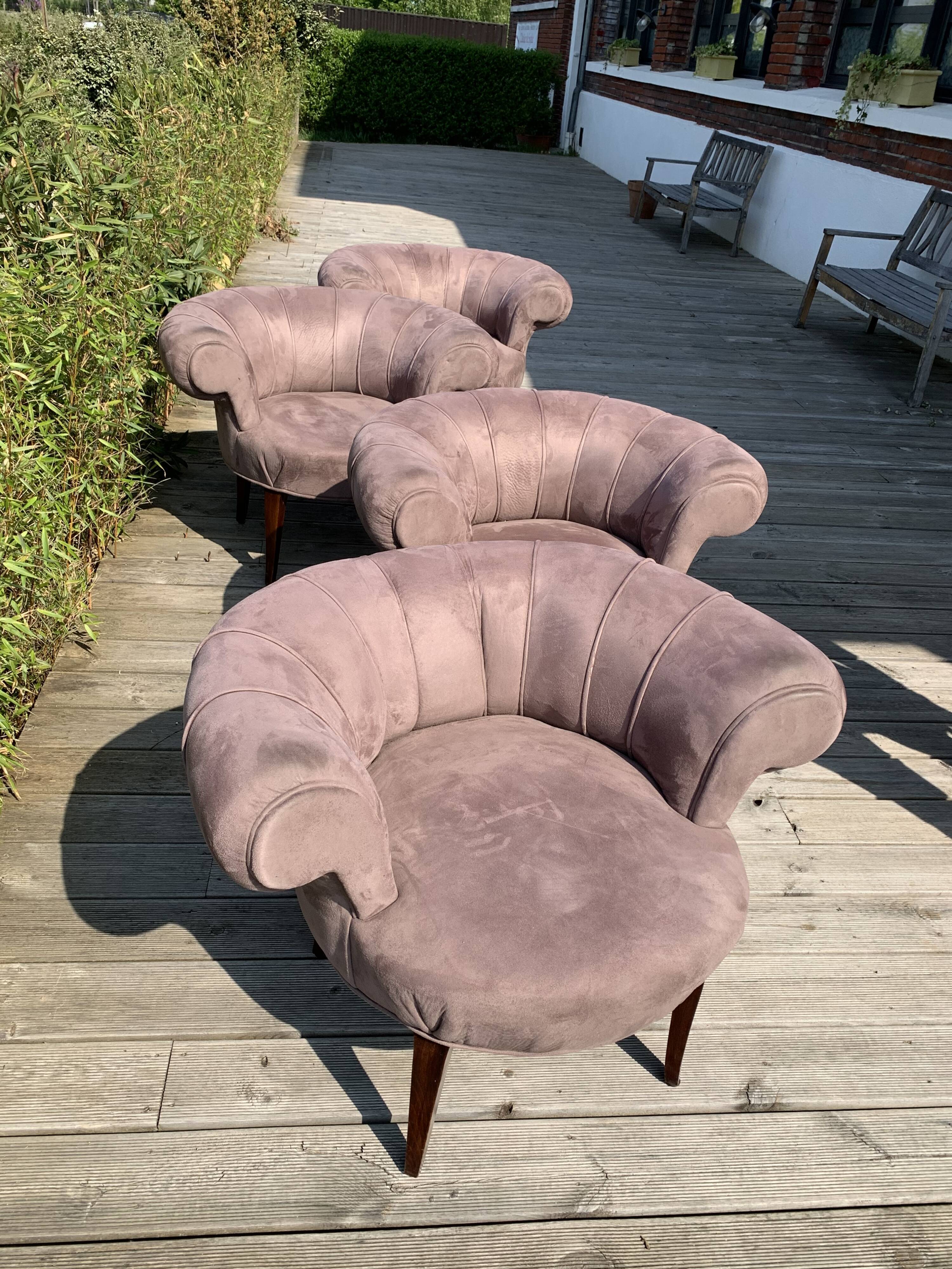 Quatre fauteuils art déco