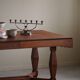 Art Deco dining table in teak, with butterfly extension, Danish cabinetmaker, 1940s.