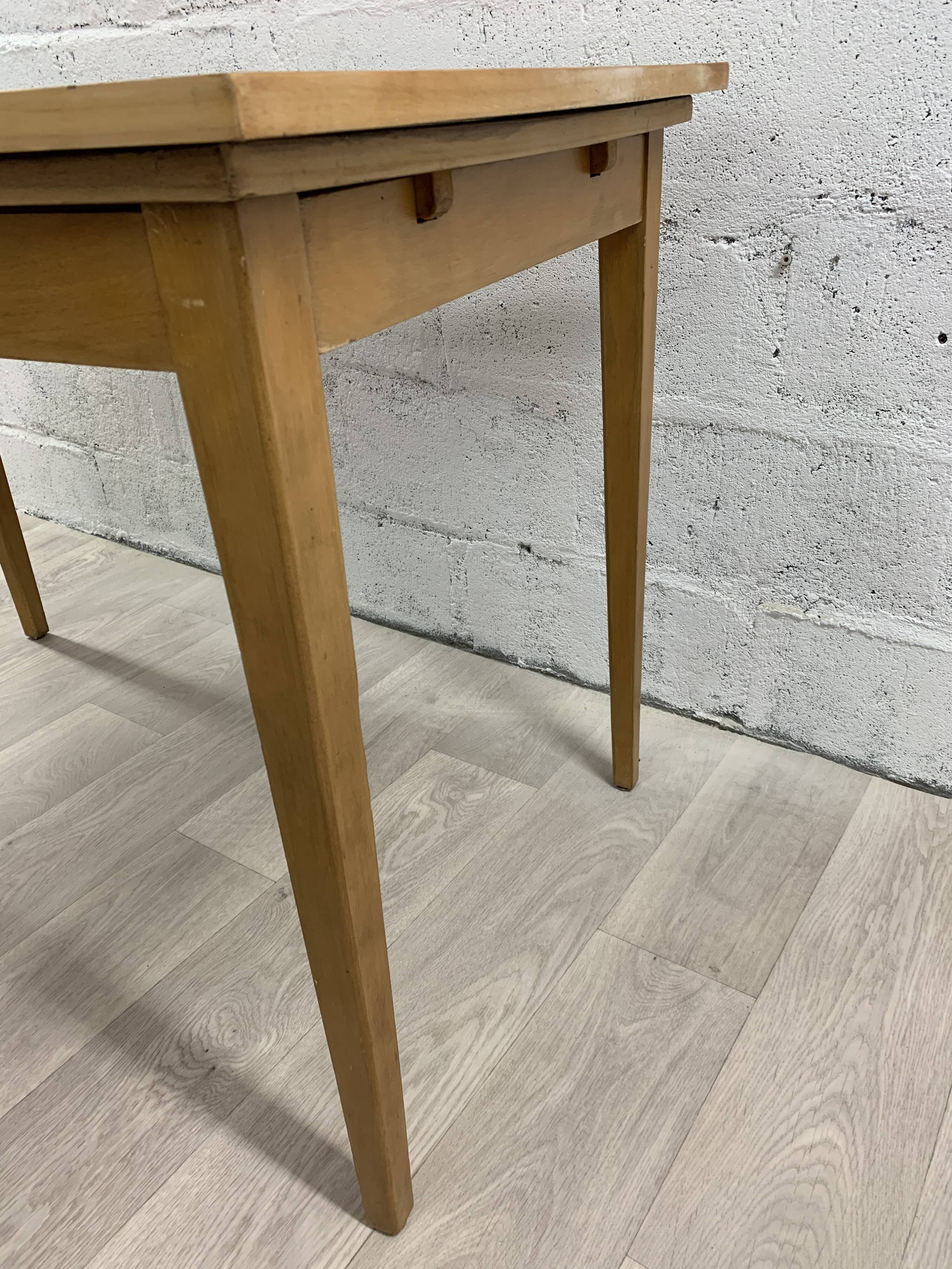 Light-wood dining table by L'bke