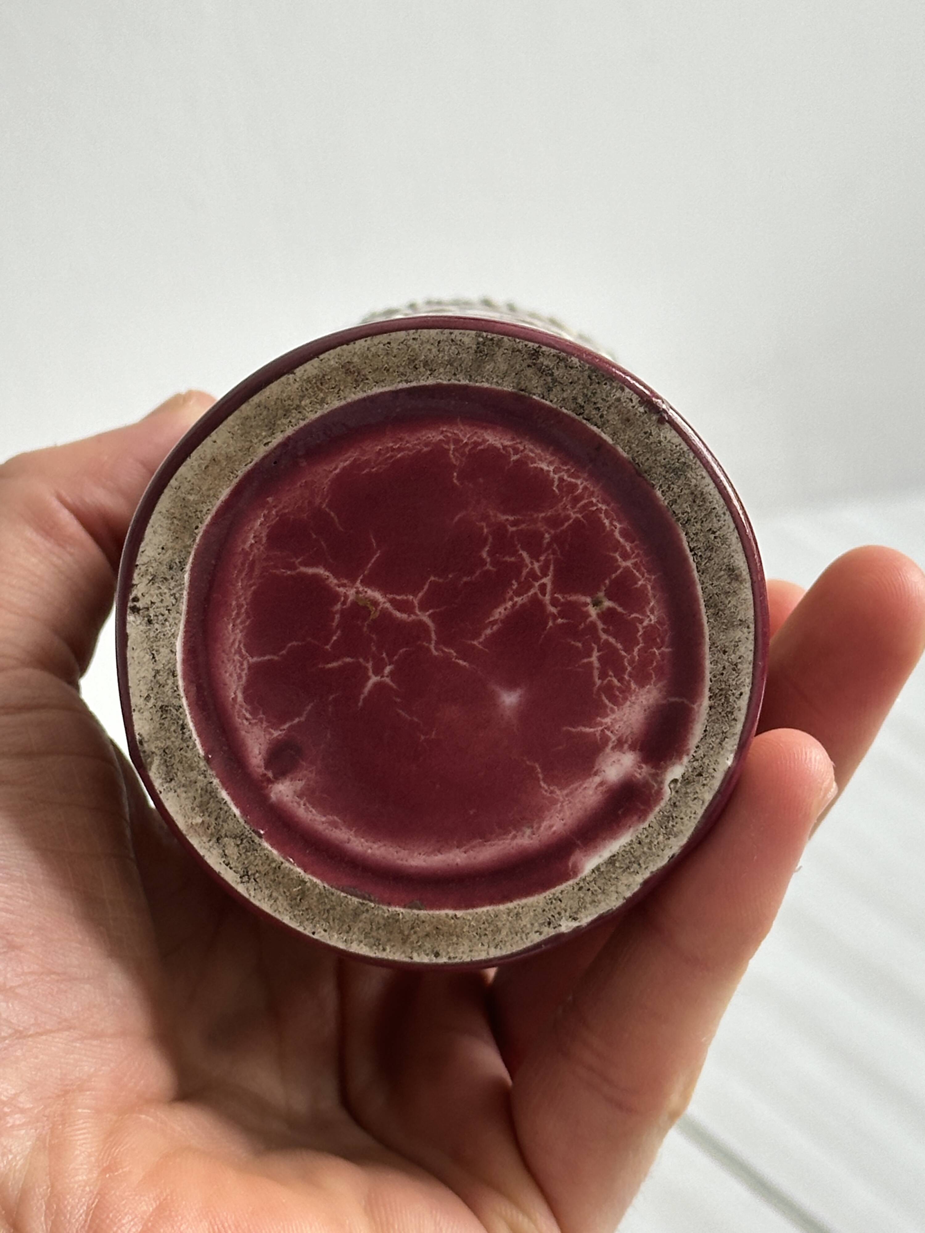 Small antique roller vase in red enamelled ceramic
