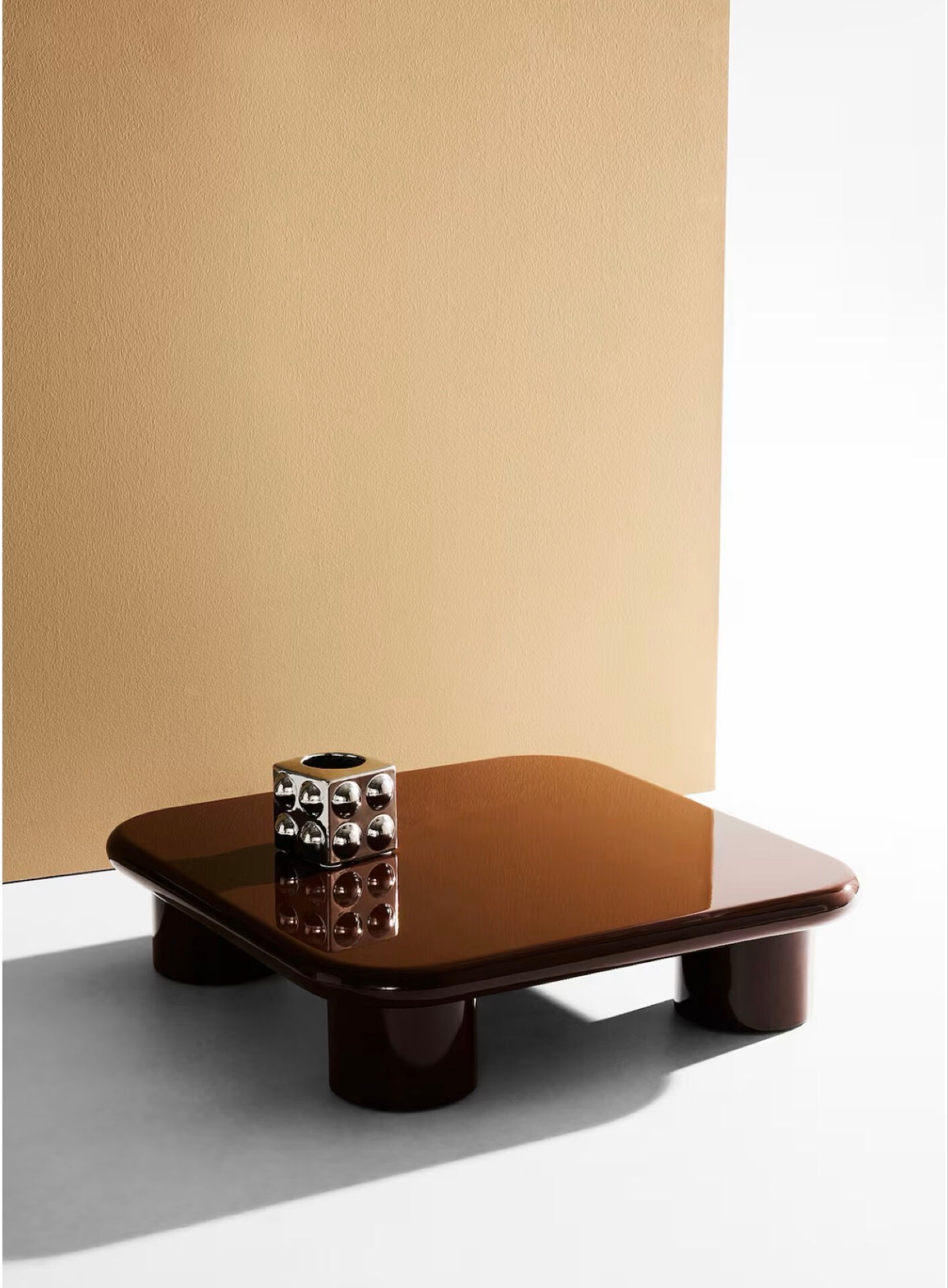 Chocolate varnished coffee table Pastill