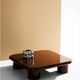 Chocolate varnished coffee table Pastill