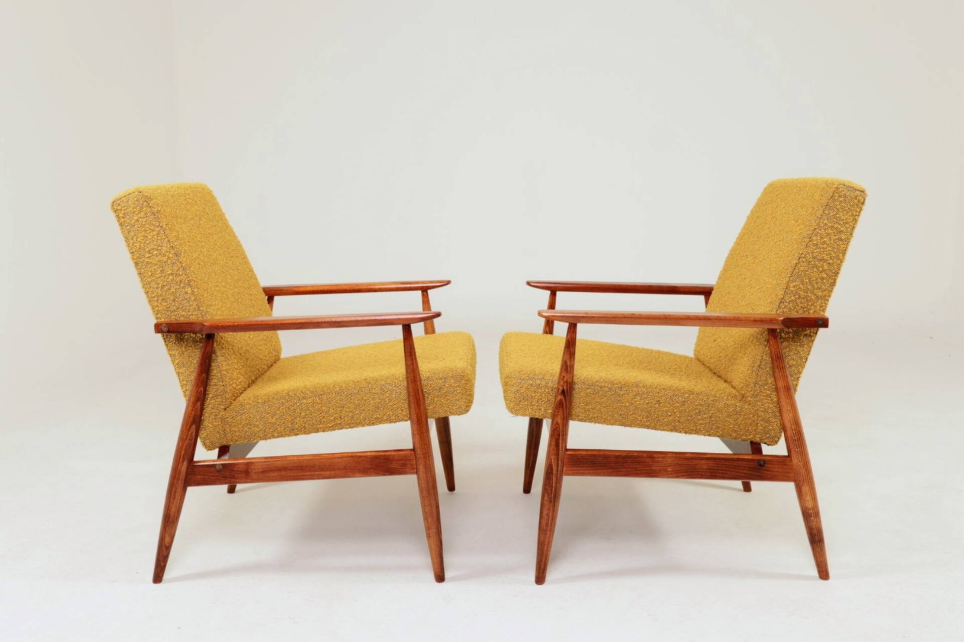Pair of vintage boucle mustard armchairs H.Lis